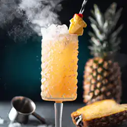 Une image de Le cocktail parfait pour une soirée d'été : Tropical Peach Fizz 🍹🌴